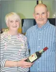  ?? (Pic: John Ahern) ?? J.P. Dixon from Castletown­roche, receiving his raffle prize from Mary O’Brien at last Friday night’s social dancing in Kilbehenny Community Centre.