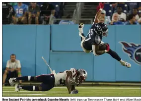  ?? (AP/George Walker IV) ?? New England Patriots cornerback Quandre Mosely (left) trips up Tennessee Titans tight end Alize Mack (87) on a pass reception in the second half of the Titans 23-7 victory on Friday in Nashville, Tenn.