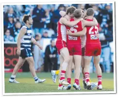  ??  ?? The Swans celebrate their 2011 win at Kardinia Park.