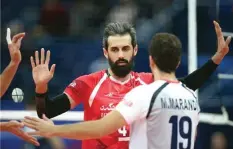  ??  ?? volleyball.world Iran’s captain Saied Marouf celebrates a point with teammates during a 3-0 victory over China at the 2018 Volleyball Nations League in Ufa, Russia, on June 8, 2018.