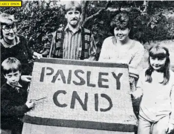  ??  ?? EARLY 1980S
Left, Liz Truss leaving 10 Downing Street yesterday; above, posing with a CND banner; right, after becoming the first female Lord Chancellor; below, as education minister visiting a nursery in Peckham with the then London mayor Boris Johnson