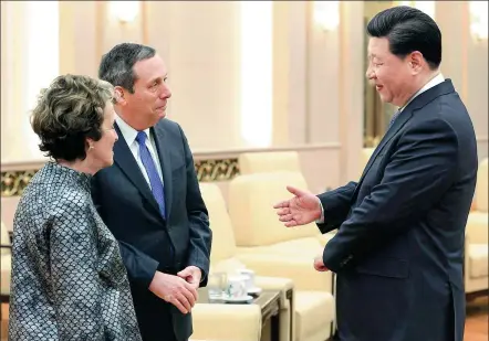  ?? WU ZHIYI / CHINA DAILY ?? President Xi Jinping meets Harvard University President Lawrence Bacow and wife, Adele, at the Great Hall of the People in Beijing on Wednesday.