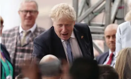  ?? Photograph: WPA/Getty Images ?? Boris Johnson arrives to watch the Queen’s platinum jubilee pageant outside Buckingham Palace on Sunday.