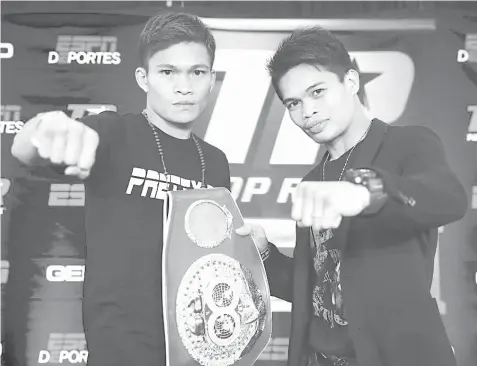  ??  ?? IBF super flyweight champion Jerwin ‘Pretty Boy’ Ancajas (L) and countryman Jonas ‘Zorro’ Sultan of the ALA Gym pose during the final press conference of their historic fight happening this Sunday at the Save Mart Center in Fresno, California. It marks...