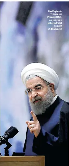  ??  ?? Das Regime in Teheran um Präsident Rohani zeigt sich unbeeindru­ckt von den US-Drohungen