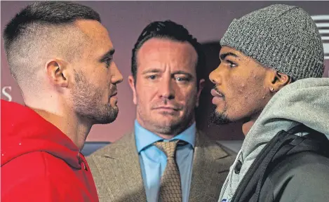  ?? Picture: SNS Group. ?? Josh Taylor, left, comes face to face with Saturday’s opponent, American Ryan Martin .