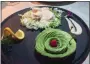  ?? PHOTO BY STEPHEN FRIES ?? Tender prawns are served alongside avocado, shaped like a flower at Bar Delle Terme.