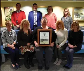  ?? COURTESY OF NPSD ?? The North Penn School District’s business office poses with the ASBO Meritoriou­s Budget Award, recently announced for the eighth straight time.