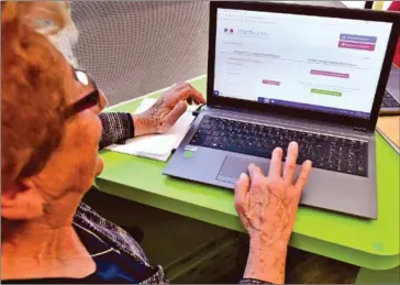  ?? AFP ?? Digital training groups promise to demystify technology for older people who may have previously resisted smartphone­s, apps and online services.