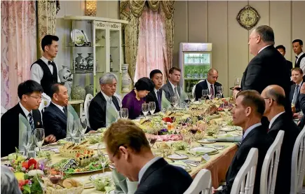  ?? AP ?? US Secretary of State Mike Pompeo, right, speaks during a dinner for North Korean dignitarie­s and US diplomats in Pyongyang this week. Pompeo has offered American economic help to impoverish­ed North Korea if it gives up its nuclear weapons.