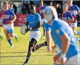  ??  ?? ON THE MOVE: Grey fullback Sihle Njezula cuts through the Framesby defence in their schools rugby match at the weekend
