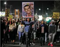  ?? - Reuters ?? PROTEST MARCH: Demonstrat­ors march to protest the police shooting of Stephon Clark, in Sacramento, California, US on March 23, 2018.