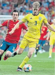  ?? ?? Filip Helander snuffs out Spain’s Mikel Oyarzabal