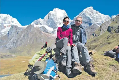  ?? ?? g Circuit-breaker: Kate and Chris enjoy a moment’s rest on the Huayhuash trail