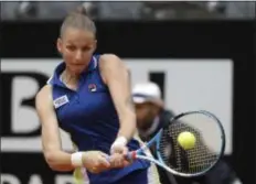  ?? GREGORIO BORGIA — THE ASSOCIATED PRESS ?? Karolina Pliskova returns a shot to Johanna Konta, of Britain during their final match at the Italian Open in Rome Sunday.