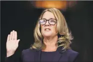  ?? Jim Bourg / Associated Press ?? Christine Blasey Ford is sworn in to testify before the Senate Judiciary Committee in Washington on Thursday.