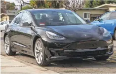  ??  ?? Model 3 starts at $35,000, with options that add at least $5,000 or more.