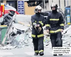  ??  ?? Firefighte­rs at the scene of a gas leak explosion in Paris