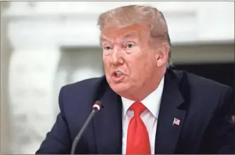  ??  ?? President Donald Trump speaks during a roundtable with governors on the reopening of America’s small businesses, in the State Dining Room of the White House in Washington on Thursday.