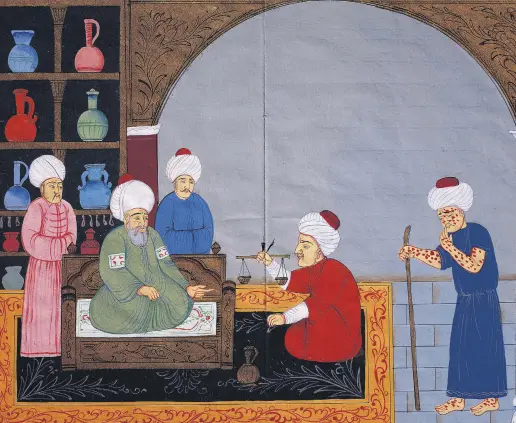  ??  ?? An Ottoman miniature depicts the preparatio­n of medicines for the treatment of a patient suffering from smallpox by Ibn Sina (L), also known as Avicenna.