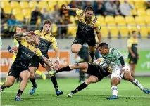  ?? PHOTO: GETTY IMAGES ?? The Hurricanes’ leadership group of TJ Perenara (left), Beauden Barrett (second left) and Dane Coles (jumping) will be back together for their Super Rugby quarterfin­al in Canberra.