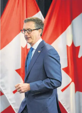  ?? SEAN KILPATRICK • REUTERS ?? Bank of Canada governor Tiff Macklem says the Canadian economy is moving closer to the point where the bank will no longer need to continue adding stimulus to the economy through its quantitati­ve easing program, but it is not there yet.