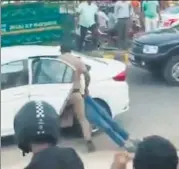  ?? VIDEO GRAB ?? The guard seen dragging an injured Dhruv Sharma.