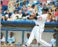  ?? THE NEWS‑HERALD FILE ?? Indians outfielder Michael Brantley swings during a rehab assignment with the Captains on July 13 at Classic Park.