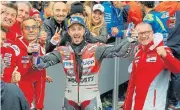  ??  ?? Ducati Team’s Andrea Dovizioso celebrates winning the race.