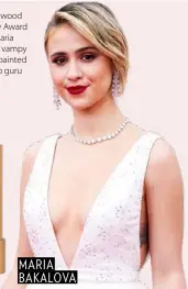  ??  ?? Embracing classic Hollywood glam, first-time Academy Award nominated actress Maria Bakalova stunned with a vampy red lip from Sisley-Paris, painted on perfectly by makeup guru Kelsey Deenihan. MARIA BAKALOVA