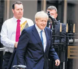  ?? Niklas Halle’n / AFP/Getty Images ?? New Conservati­ve Party leader and incoming Prime Minister Boris Johnson will take office at one of the most crucial moments in Britain’s recent history, immediatel­y facing his nation’s exit from the European Union in three months.