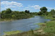  ?? DOUG DURAN — BAY AREA NEWS GROUP ?? The San Joaquin river flows past the Dos Rios Ranch, owned by River Partners, that will soon be a new California state park in Modesto.