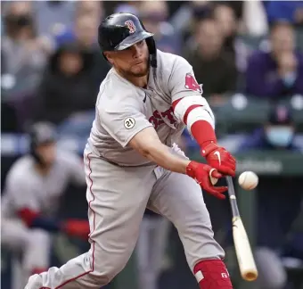  ?? Ap ?? BREAKS IT OPEN: Christian Vazquez doubles in a pair of runs during the 10th inning of the Red Sox’ 9-4 win over the Seattle Mariners on Wednesday afternoon.