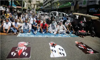  ??  ?? Palestinia­n protesters in the West Bank, 14 August 2020: ‘The official line in Abu Dhabi is that the UAE has acted to protect Palestinia­n rights by preventing Israeli annexation. Palestinia­ns themselves are understand­ably not convinced.’ Photograph: Raneen Sawafta/Reuters