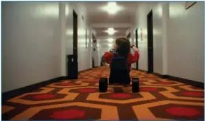  ??  ?? The young Danny Torrance (Roger Dale Floyd) navigates the hallways of the Overlook Hotel in Mike Flanagan’s
Doctor Sleep.