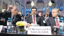 ?? Joe Klamar
AFP/Getty Images ?? OPEC SECRETARY-GENERAL Abdalla El-Badri, left, and the oil ministers of Qatar and Saudi Arabia attend a seminar in Vienna ahead of the OPEC meeting.