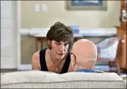  ?? HYOSUB SHIN / HYOSUB.SHIN@AJC.COM ?? Karen J. Hardwick talks to her husband, Greg, who has been battling Alzheimer’s disease, at Addington Place at the Mills in Roswell last week. She was recently forced to place her husband into a memory care facility.