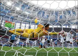  ?? ALEXANDER HASSENSTEI­N / GETTY IMAGES ?? Hugo Lloris of France makes a save Friday during the World Cup quarterfin­al match against Uruguay in Nizhny Novgorod, Russia.