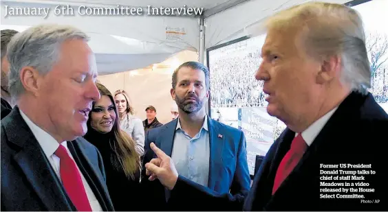  ?? Photo / AP ?? Former US President Donald Trump talks to chief of staff Mark Meadows in a video released by the House Select Committee.