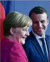  ?? (Photo AFP) ?? Merkel-Macron : le courant passe bien. Sauf dans le dossier gréco-turc.