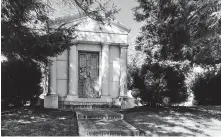  ?? Amy Bertrand / TNS ?? Rogers is buried in the family mausoleum at Unity Cemetery.