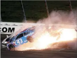  ?? COLIN E. BRALEY — THE ASSOCIATED PRESS ?? Aric Almirola (43), Danica Patrick and Joey Logano, back left, crash during the NASCAR Monster Cup auto race at Kansas Speedway in Kansas City, Kan., Saturday.