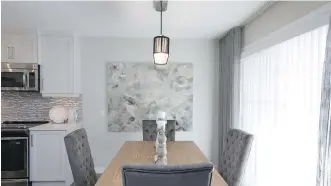  ??  ?? The dining area in the Rundle show home in Verona by Trico Homes.