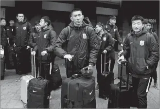  ?? MANU FERNANDEZ/AP PHOTO ?? Players of the Chinese Super League team Wuhan Zall arrive at the Atocha train station on Feb. 29.