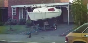  ??  ?? Remember when? Keith Wheeler’s home-built Pirate 19 on her trailer outside his house circa 1979. Boats actually don’t change that much, but look at that car...