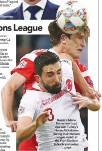  ?? AFPPIX ?? Koeman Russia’s Mario Fernandes (top) vies with Turkey’s Hasan Ali Kaldirim during their Nations League match at the Fisht Stadium in Sochi yesterday. –