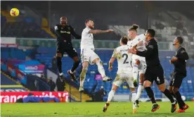  ?? Photograph: Jason Cairnduff/Reuters ?? Angelo Ogbonna (left) rises to head home West Ham’s winner at Elland Road.