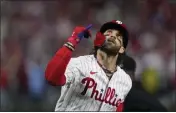  ?? MATT ROURKE – THE ASSOCIATED PRESS Schwrbr dh Turner ss Harper 1b Bohm 3b Stott 2b Realmuto c Cstlans rf Marsh lf Rojas cf ?? The Phillies' Bryce Harper looks up after homering during the fifth inning of Game 3of the NLDS on Wednesday.