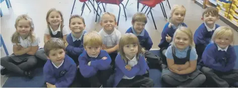  ??  ?? The Hertford Vale C of E Primary School reception class new starters pose for a photograph