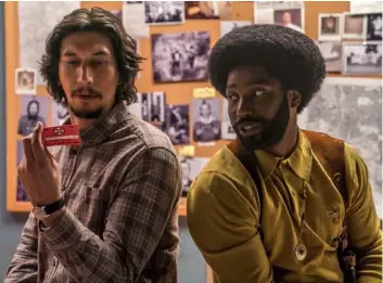  ?? Photo courteSy of focuS featureS. ?? adam Driver as Flip Zimmerman and John David Washington as ron Stallworth in Spike lee’s Blackkklan­sman.